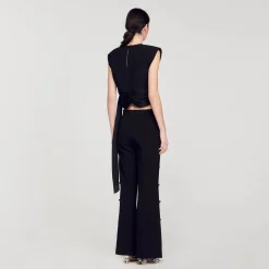 Pantaloni Svasati Traforati Sui Lati